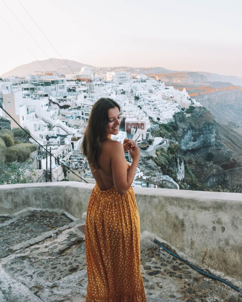 girl on the stairs in Fira, Santorini island