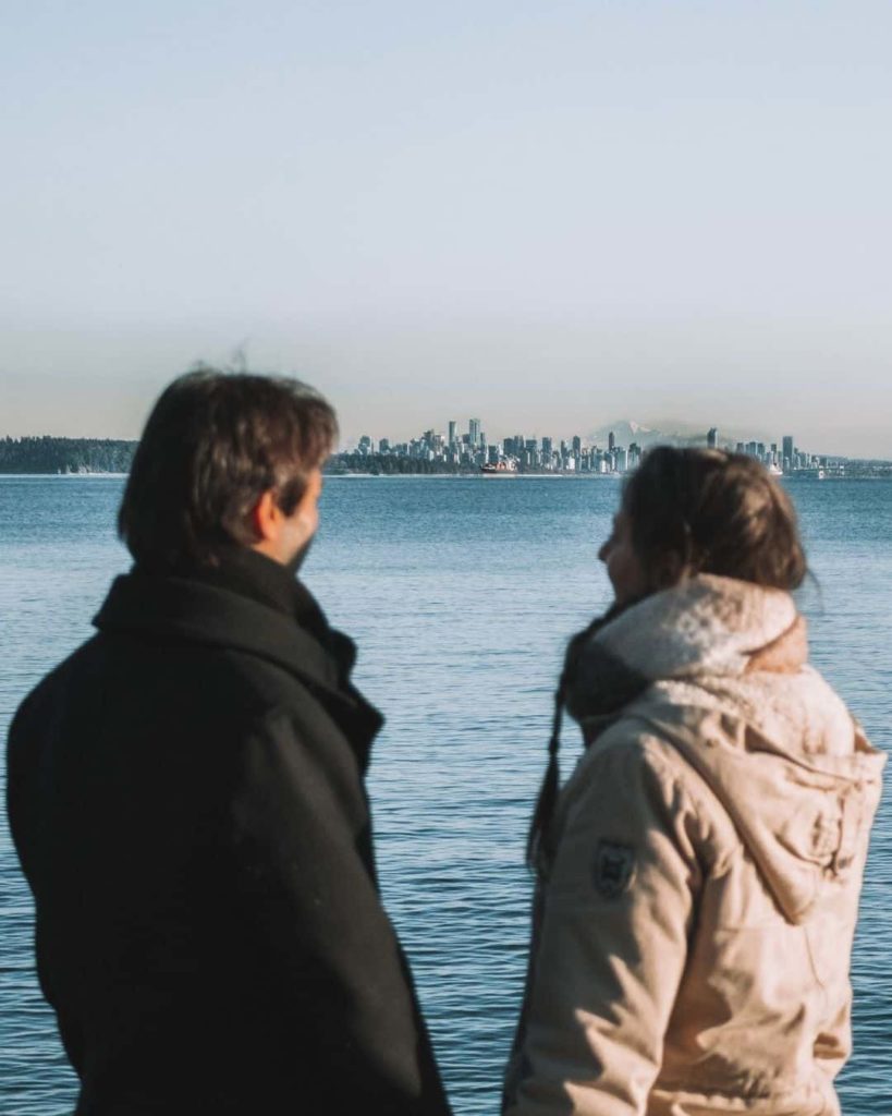 Couple looking at Vancouver from Lighthouse Park
