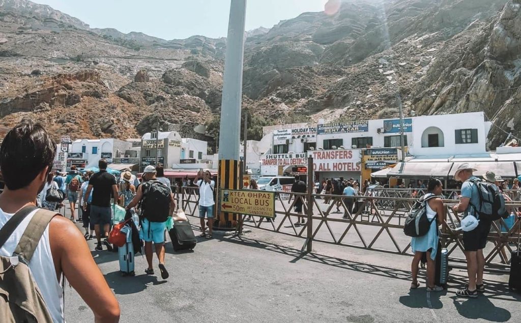 People finding shuttles from Santorini ferry port