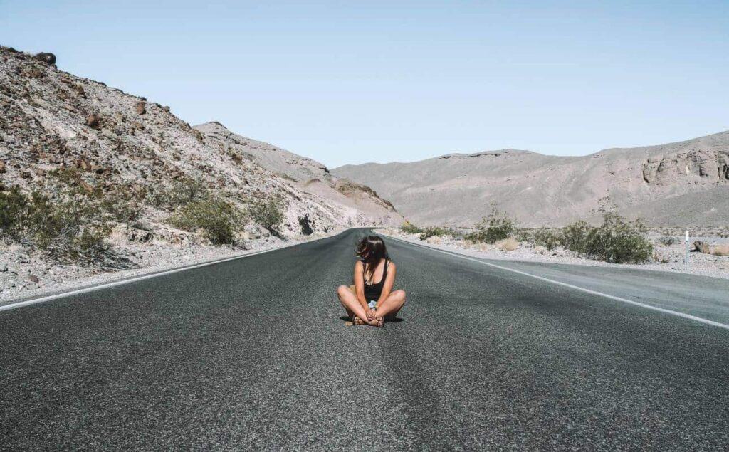Marie on the road in Death Valley