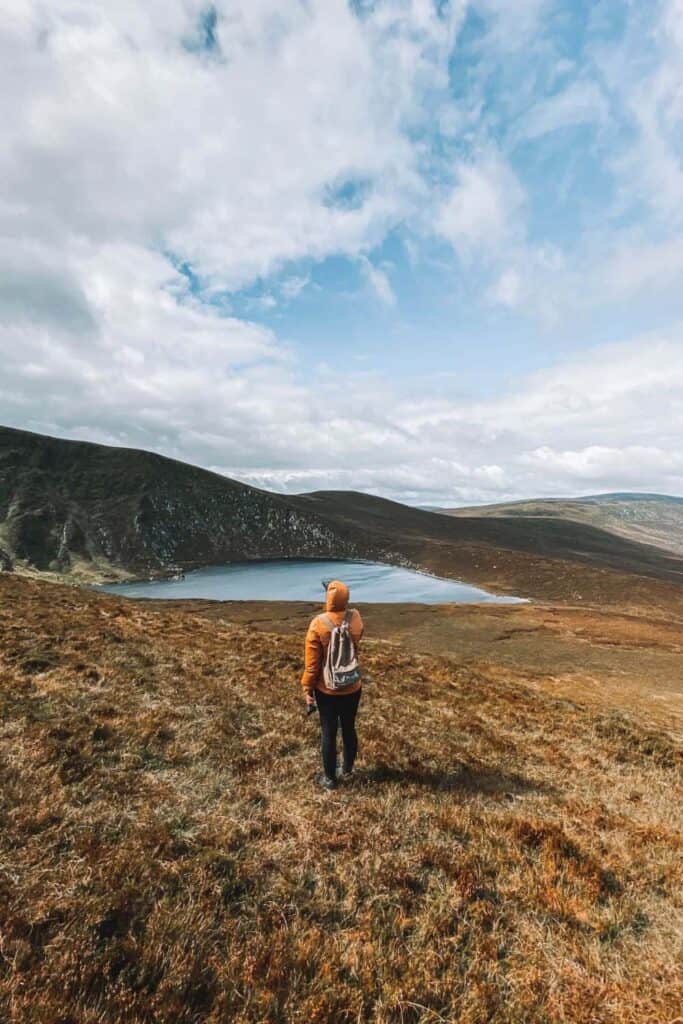 Me standing in front of Lough Ouler, a heart shaped lake in the Wicklow Mountains National Park in Ireland