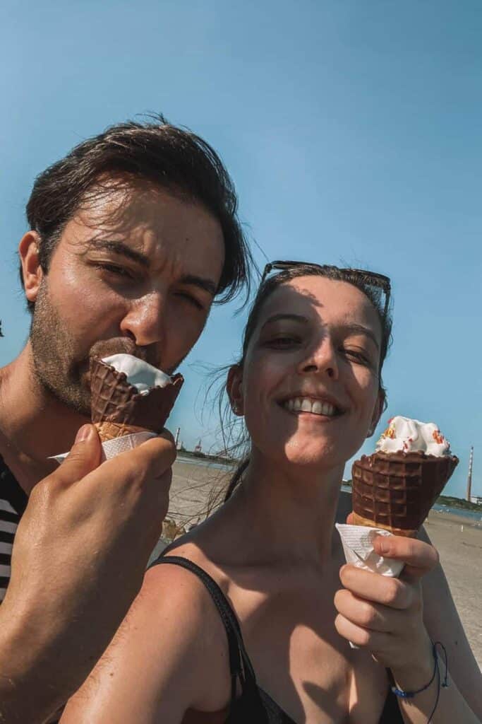 Us having an ice cream date at the beach, one of the best beach date ideas for couples