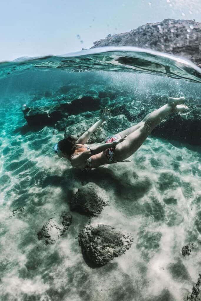 Us snorkeling in Greece, one of the coolest beach date ideas