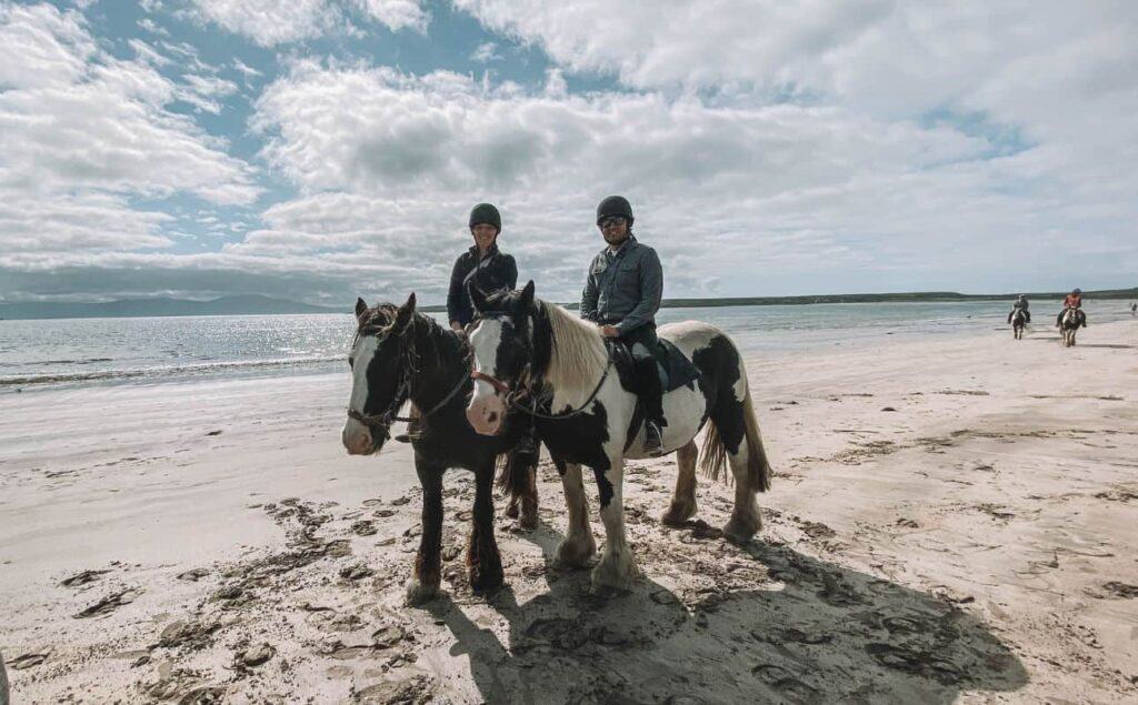Us horseback riding on the beach, one of the alphabet dating ideas with a H