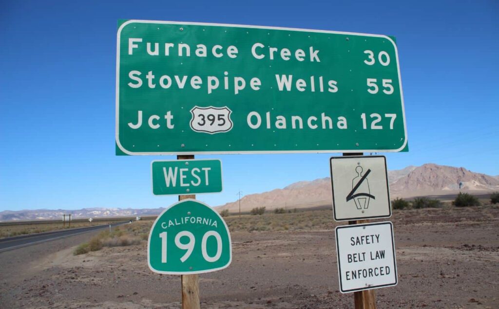 Sign indicating mileage to Furnace Creek and Stovepipe Wells