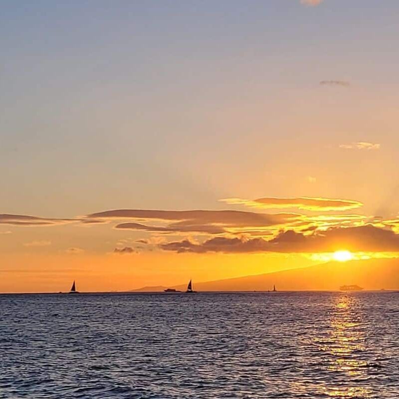Oahu sunset from the catamaran cruise, one of the best sunset cruises in Waikiki