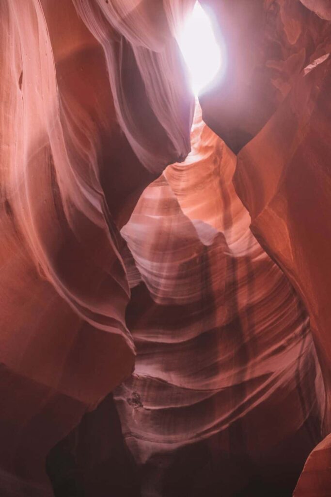 Upper vs Lower Antelope Canyon, Orange twists and twirls sandstone walls of Upper Antelope Canyon