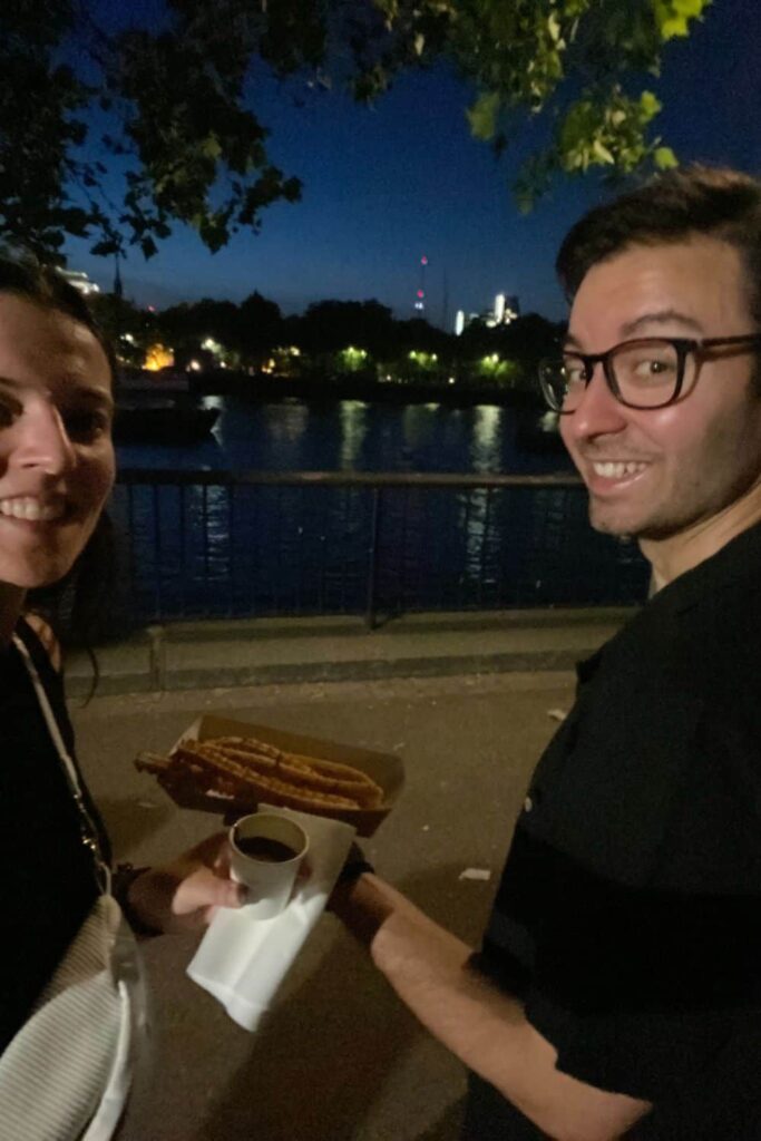 Us during our London date having churros by the Thames