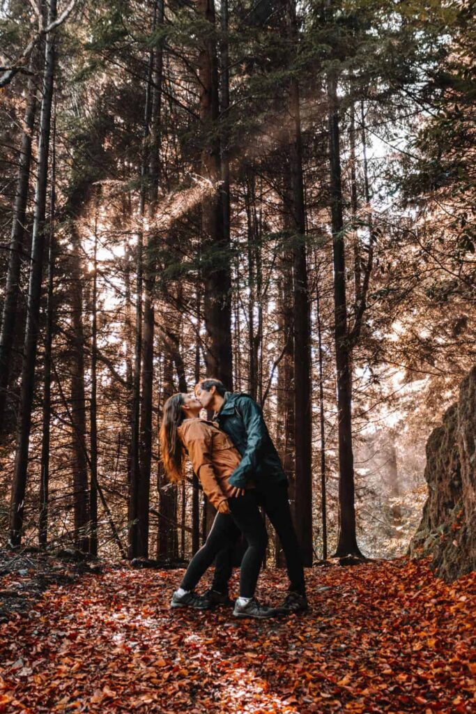 Us kissing in the Fall Foliage in Devil's Glen in Wicklow National Park