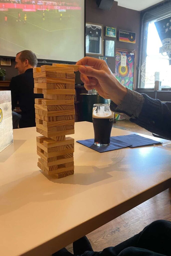 I took this photo of Eric placing his piece of wood on our Jenga Game