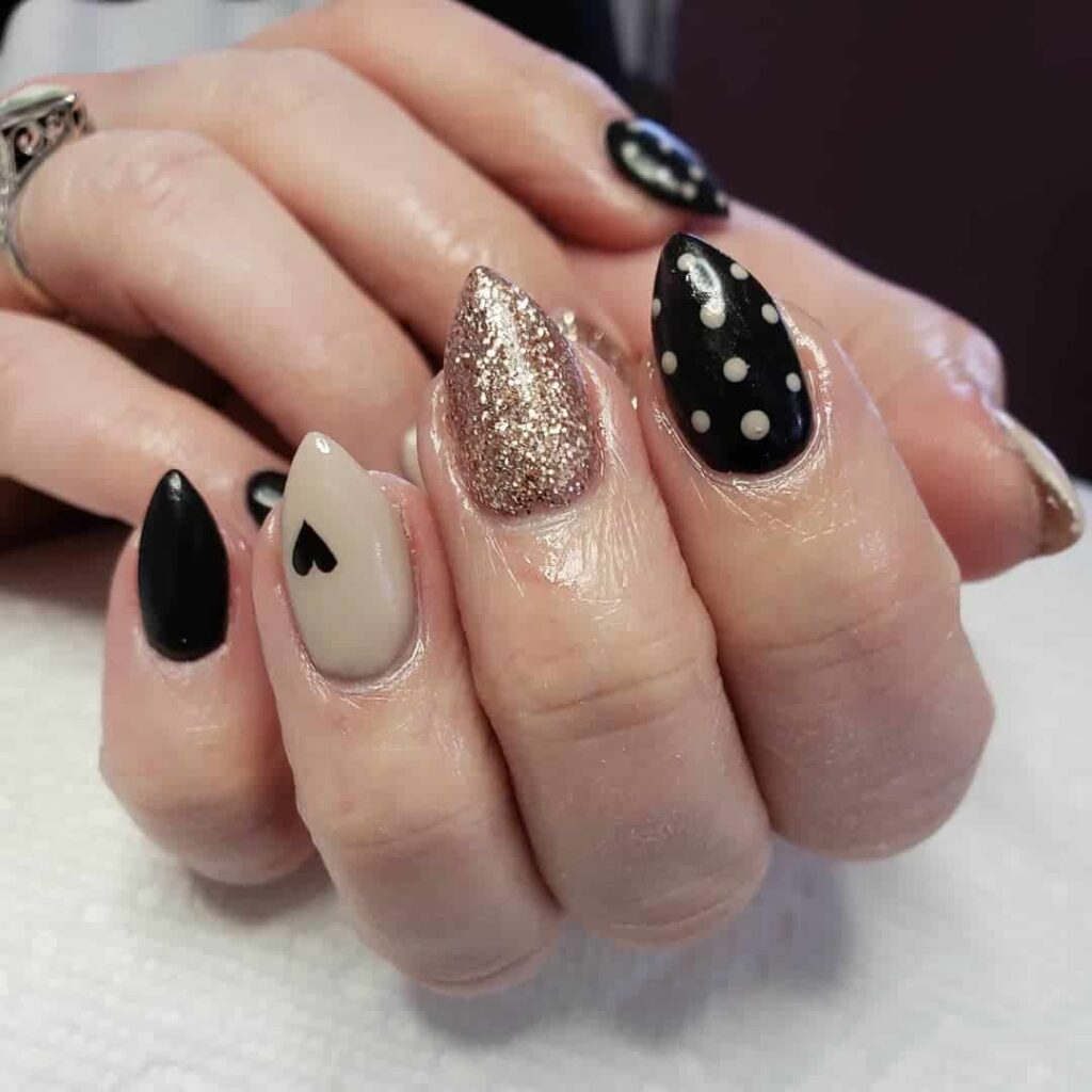 Black and beige Valentines day nails by @gypsy.nail.girl