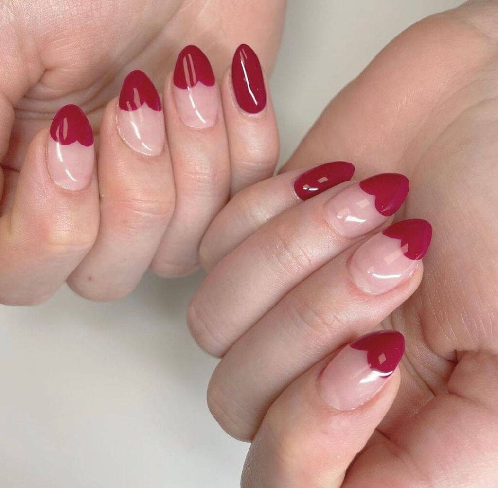 Heart shaped tips nails for Valentine's day by @crow_nail_studio