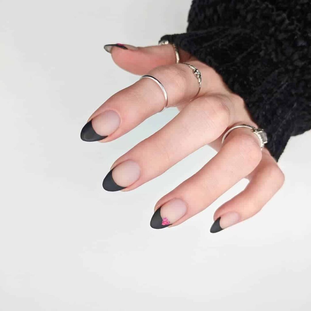 Not so pink Valentine's Day nails with small pink heart by @torimnails