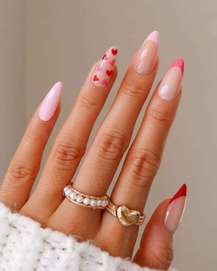 Pink French tips and pink hearts manicure for Valentine's day