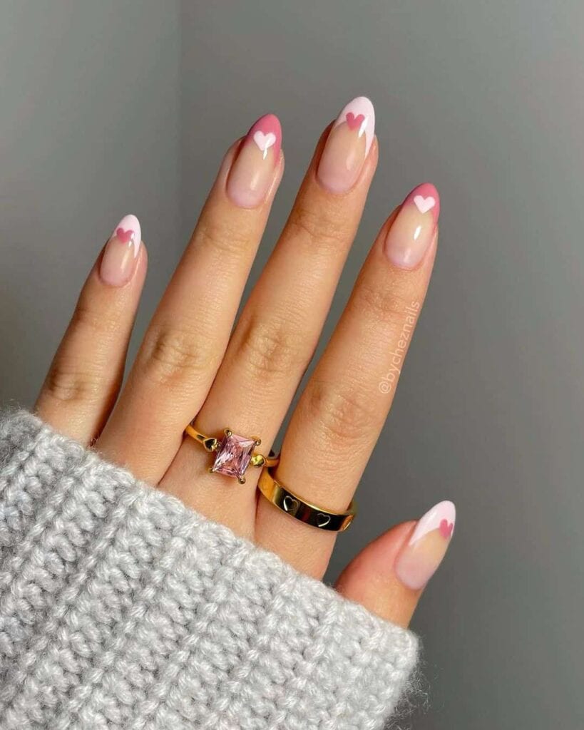 Pink and white hearts on French tips for Valentine's Day