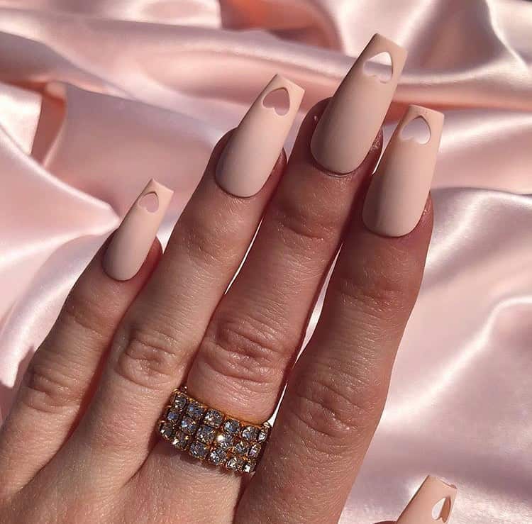 Pink heart cut out nails by @sirenareenasboutique