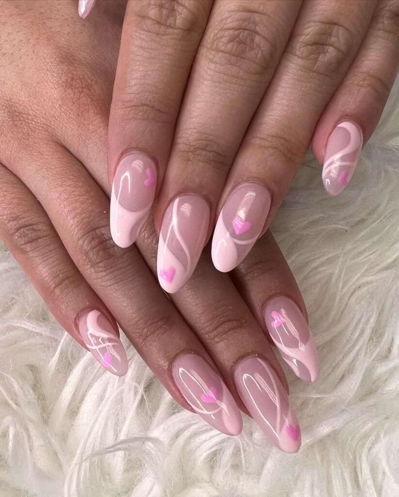 Pink mani with hearts for Valentine's day by @thenailbarbykc