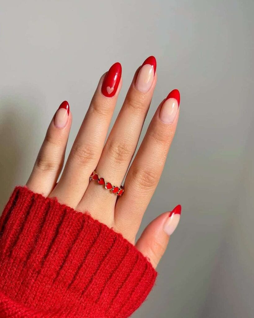 Red tips and heart mani by @iluvmeae