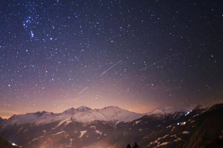 meteor shower over mountains in the USA