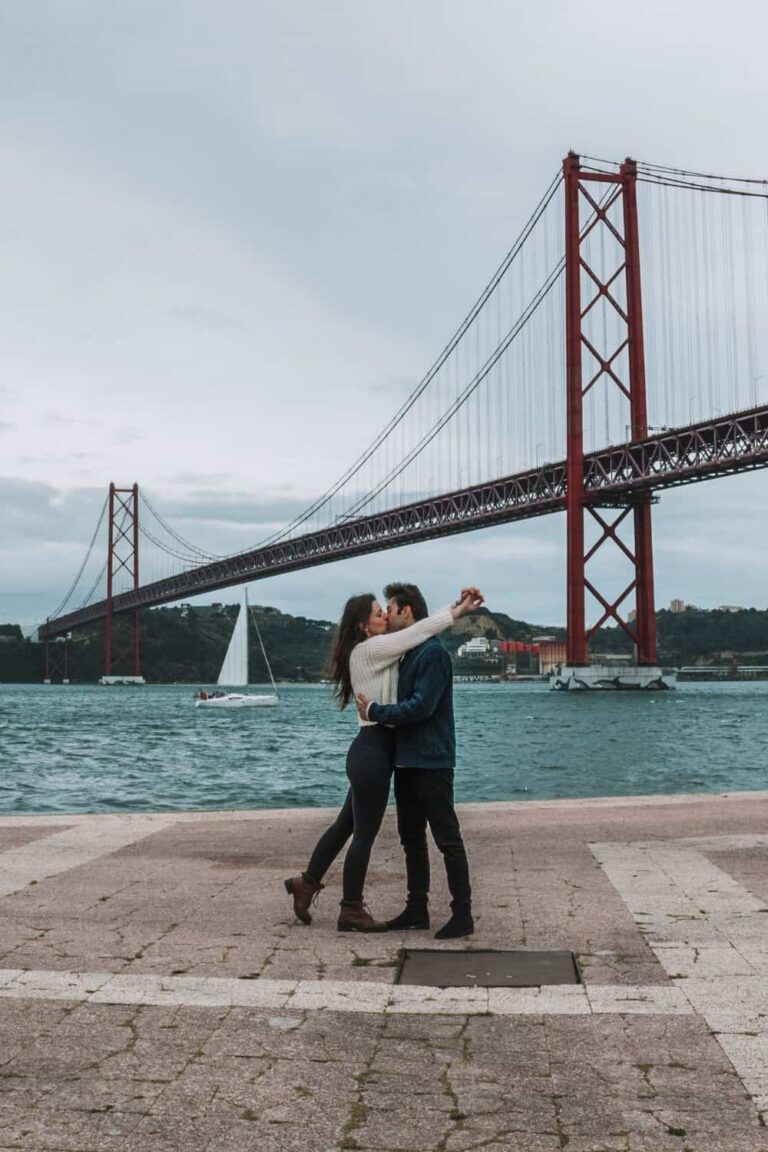 top rated Europe city breaks - us in Lisbon in front of the red bridge