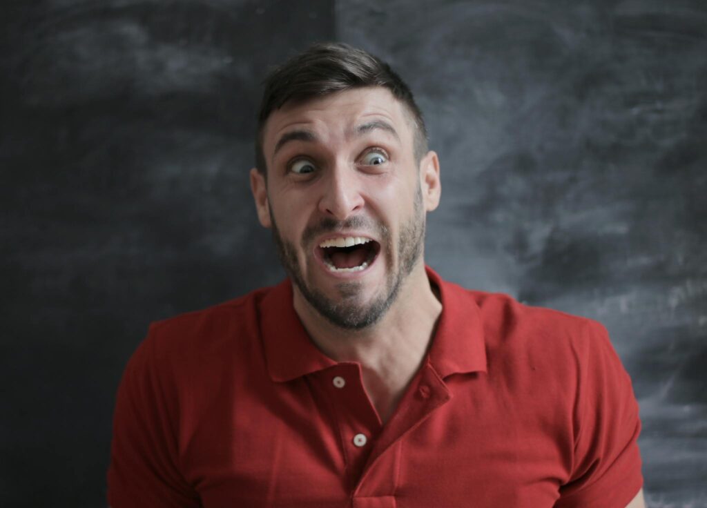 Man in Red Polo Shirt