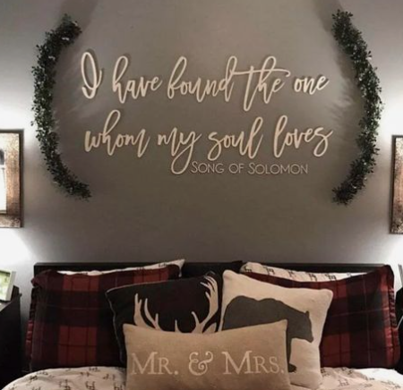 Quote wall decor idea for couple's bedroom