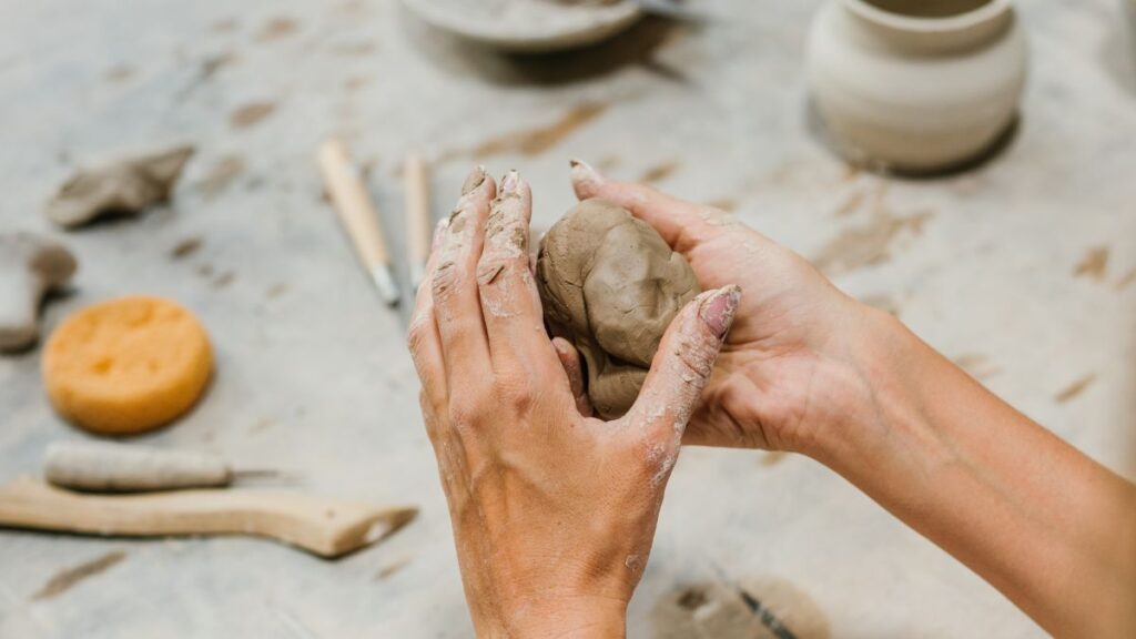 molding the clay