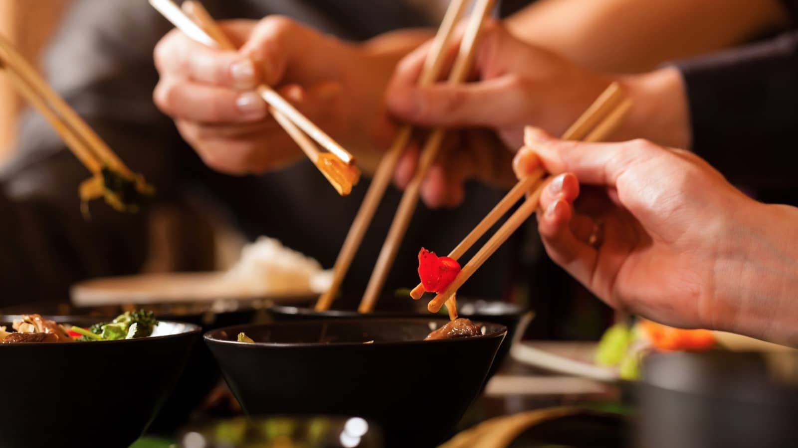 chopsticks eating sharing meal shutterstock_102940892resized