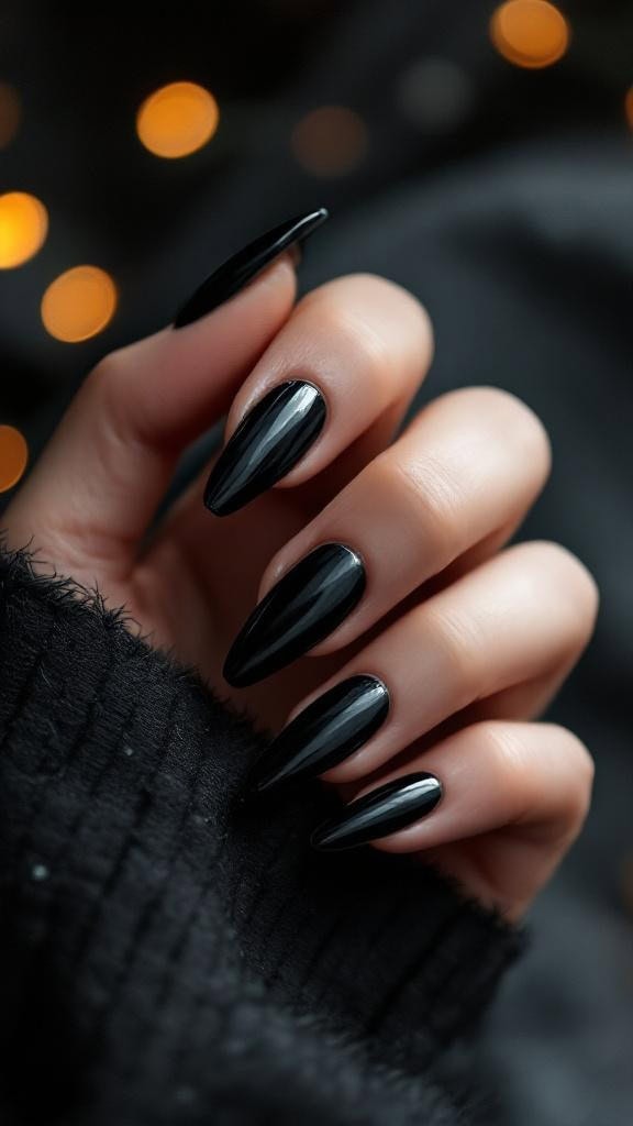 Close-up of black velvet nails with a shimmer effect