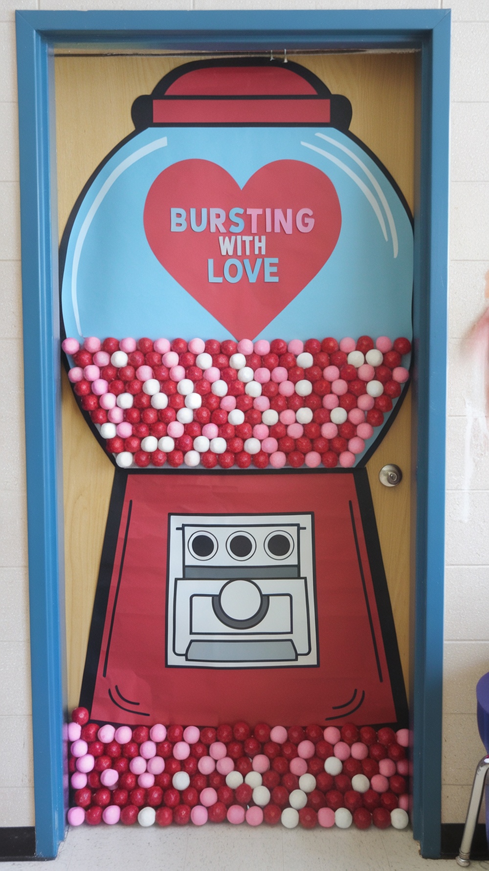 Classroom door decorated as a gumball machine for Valentine's Day with colorful gumballs and a heart saying 'Bursting with Love.'